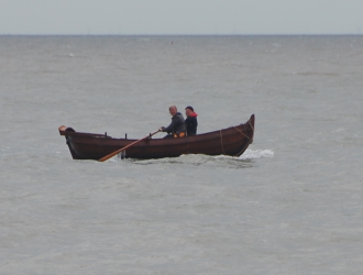 Dutch marines in landing boat off shore
