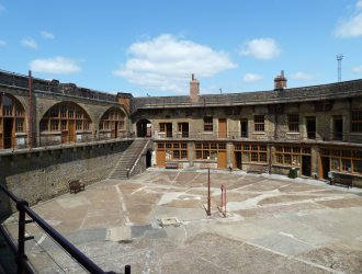 Inner parade ground showing the upper level casemates, officers quarters and lower level exhibit rooms
