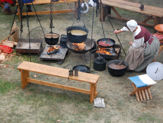 17th Century outdoor cooking preparation